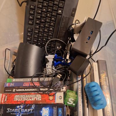 Sale Photo Thumbnail #228: various computer games and computer or technology related items.