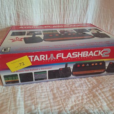 Sale Photo Thumbnail #158: This is a flashback2  not an original atari  does not require a RF box but does connect through AV cables so you still need an older TV with an AV input.  Looks to be new in box. 