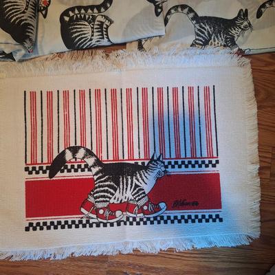 Sale Photo Thumbnail #195: These don't appear to have ever been used however the elastic in both fitted sheets are crumbly and wouldn't work well.  There are two sheet sets, one with the sitting cat and one with the cat wearing red shoes.  Both sets have the pillowcase as cat with 