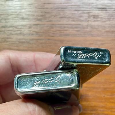 Pair of vintage Zippo + Scripto butane lighters