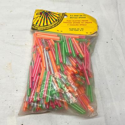 Lot 734 Bag of Spoke-ettes