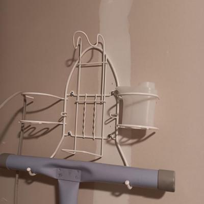 ROWENTA PROFESSIONAL CLOTHES IRON, IRONING BOARD AND A WALL MOUNTED HOLDER