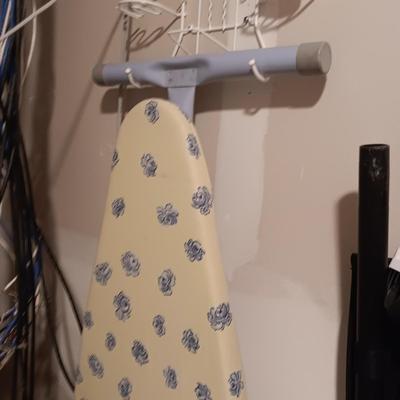 ROWENTA PROFESSIONAL CLOTHES IRON, IRONING BOARD AND A WALL MOUNTED HOLDER