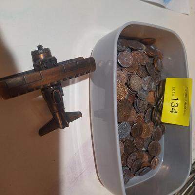 Sale Photo Thumbnail #377: most of the coins are pennies, nearly all of them are damaged like they have been put in grinder or something odd. A lot of them were wheat pennies.