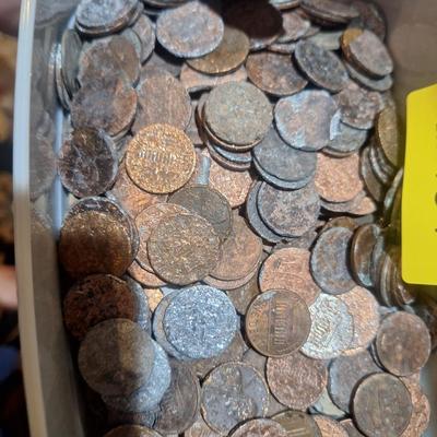 Sale Photo Thumbnail #376: most of the coins are pennies, nearly all of them are damaged like they have been put in grinder or something odd. A lot of them were wheat pennies.