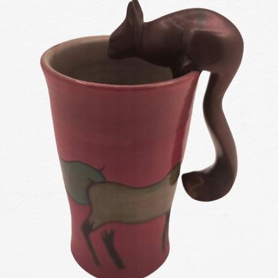 Squirrel pot hanger
