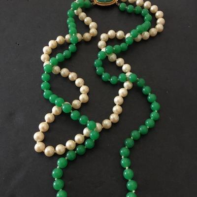 Beautiful, vintage hand knotted art, deco, green glass or jade type faux pearl necklace. Very beautiful very nice.