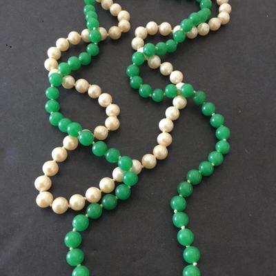 Beautiful, vintage hand knotted art, deco, green glass or jade type faux pearl necklace. Very beautiful very nice.