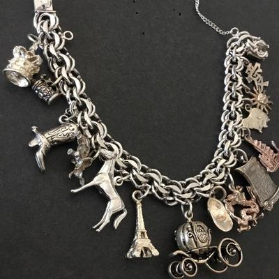 Beautiful vintage rhythm 925 sterling silver charm bracelet very nice very beautiful all sterling silver tested
