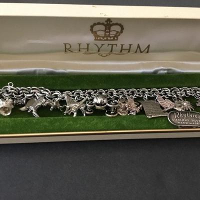 Beautiful vintage rhythm 925 sterling silver charm bracelet very nice very beautiful all sterling silver tested