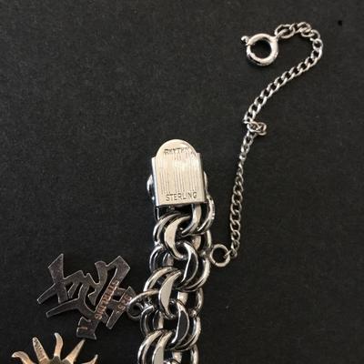 Beautiful vintage rhythm 925 sterling silver charm bracelet very nice very beautiful all sterling silver tested