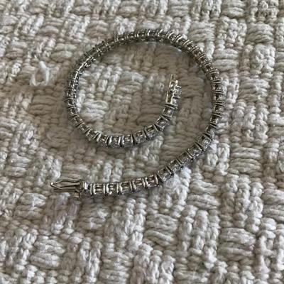 Silver tone bracelet with authentic crystal