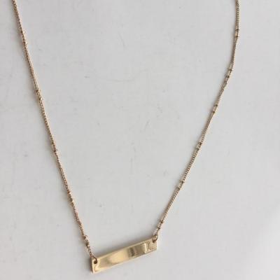 Gold tone L necklace mud pie marked