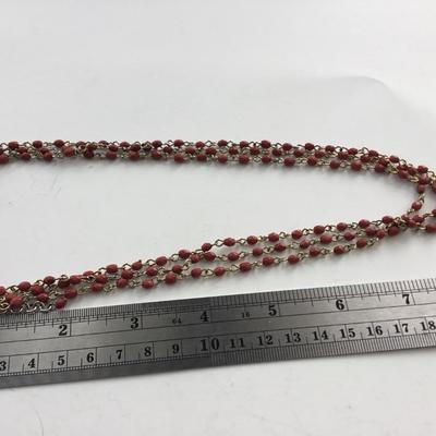 Unmarked red multilayer beaded necklace