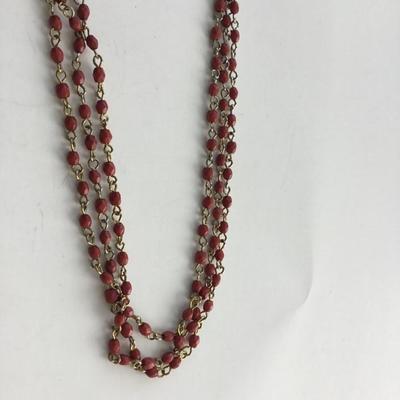 Unmarked red multilayer beaded necklace
