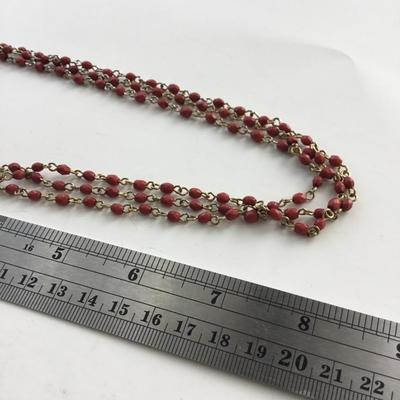 Unmarked red multilayer beaded necklace
