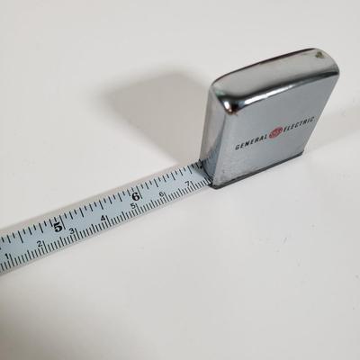 LOT 96X: GE Collectors Items; Zippo Tape Measure, Service Items, and More