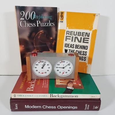 LOT 98X: Chess Lovers Lot; Heuer Chess Champion Clock and Books