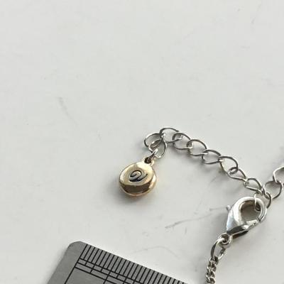 V marked beautiful necklace