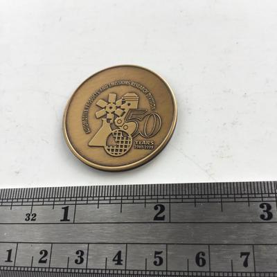 Vintage automotive products coin