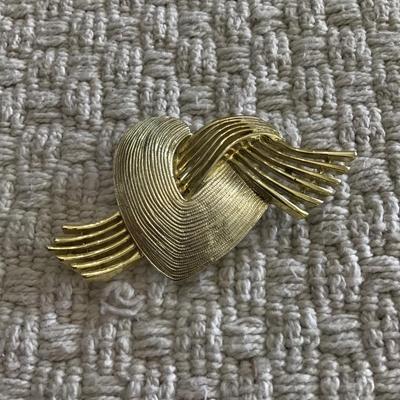 Vintage gold tone A.J.C heart brooch