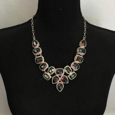 Absolutely gorgeous watermelon crystal rhinestone 925 sterling silver statement necklace very beautiful. Very nice.