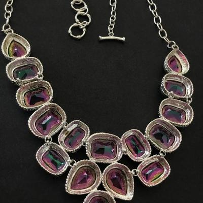 Absolutely gorgeous watermelon crystal rhinestone 925 sterling silver statement necklace very beautiful. Very nice.