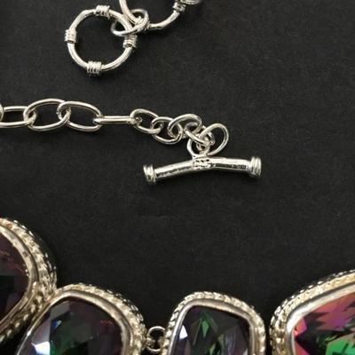 Absolutely gorgeous watermelon crystal rhinestone 925 sterling silver statement necklace very beautiful. Very nice.