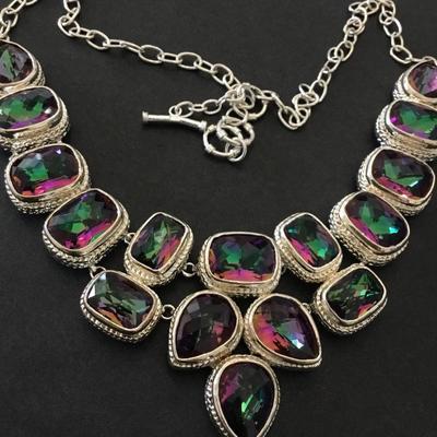 Absolutely gorgeous watermelon crystal rhinestone 925 sterling silver statement necklace very beautiful. Very nice.