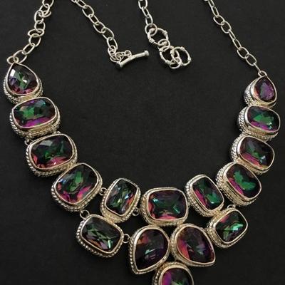 Absolutely gorgeous watermelon crystal rhinestone 925 sterling silver statement necklace very beautiful. Very nice.