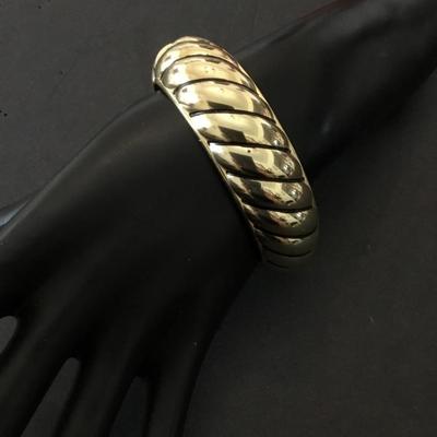 Beautiful vintage Betsey Johnson, gold toned, hinged bangle bracelet very beautiful very nice