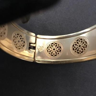 Beautiful vintage Betsey Johnson, gold toned, hinged bangle bracelet very beautiful very nice