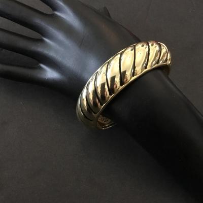 Beautiful vintage Betsey Johnson, gold toned, hinged bangle bracelet very beautiful very nice