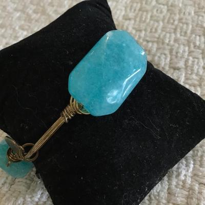 Gold tone wire wrap faux stone bangle bracelet