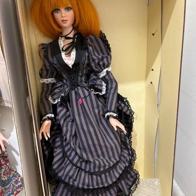 Sale Photo Thumbnail #136: Two Porcelain Dolls