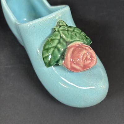 LOT 104: McCoy Dutch Shoe Planters, Delft Blue Pitcher, Ceramic Art Studio Wee Dutch Boy & Girl Salt/Pepper Shakers