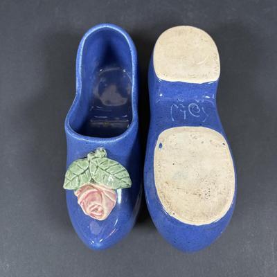 LOT 104: McCoy Dutch Shoe Planters, Delft Blue Pitcher, Ceramic Art Studio Wee Dutch Boy & Girl Salt/Pepper Shakers