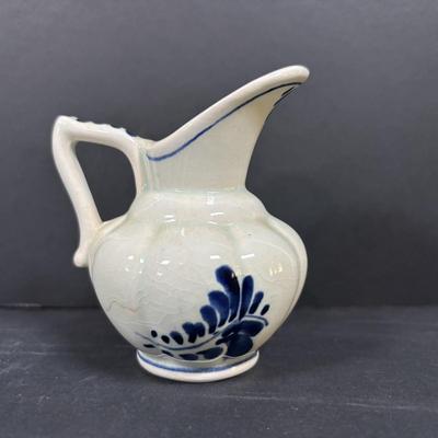 LOT 104: McCoy Dutch Shoe Planters, Delft Blue Pitcher, Ceramic Art Studio Wee Dutch Boy & Girl Salt/Pepper Shakers