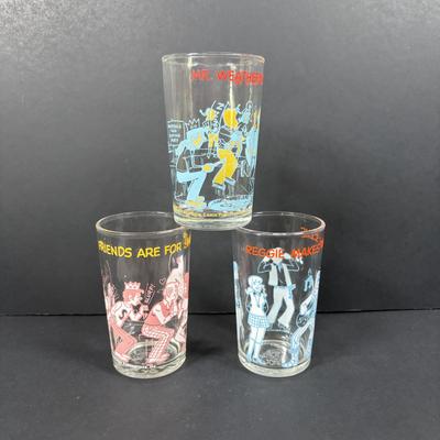 LOT 115: Children's Plates: Spiderman, Winnie the Pooh, Strawberry Shortcake along with Welch's Jelly Archie Drinking Glasses