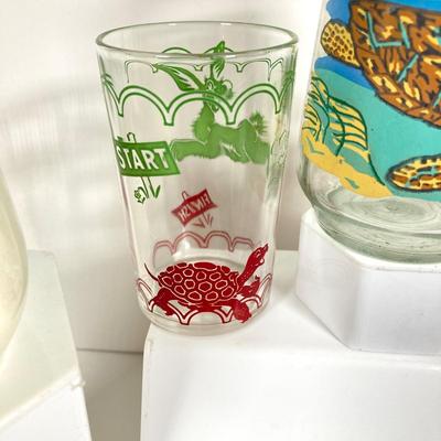 LOT 173: Collection of Children's Juice Glasses and Mugs - Welch's and Bunnykins Included