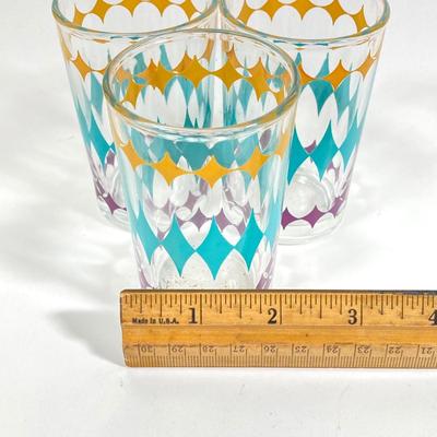 LOT 174: Collection of Colorful Vintage Juice Glasses