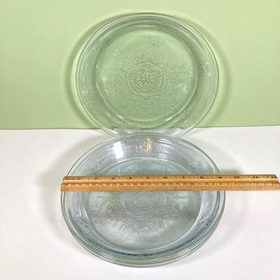 LOT 179: Large Fire King Oven Glass Collection - 2 Racks with Custard Cups, Plates, Small Lidded Bowls and Individual Custard Cups