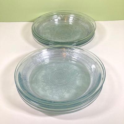 LOT 179: Large Fire King Oven Glass Collection - 2 Racks with Custard Cups, Plates, Small Lidded Bowls and Individual Custard Cups
