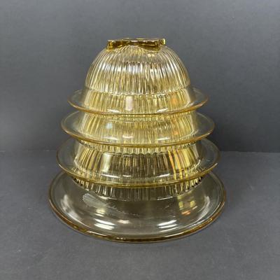 LOT 223: Set of 4 Amber Glass Mixing/Serving Bowls