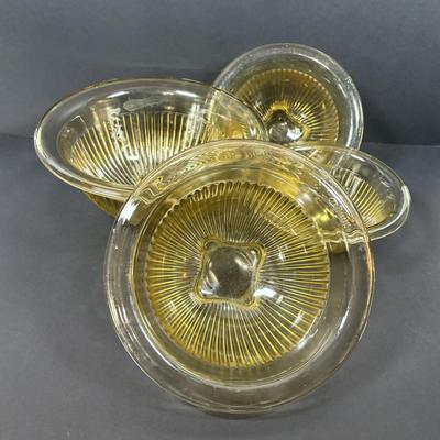 LOT 223: Set of 4 Amber Glass Mixing/Serving Bowls