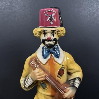 LOT 230: Ezra Brooks Shriner Clown Decanter, Sad Clown Biscuit Jar, Salt /Pepper Clowns and More