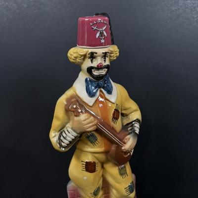 LOT 230: Ezra Brooks Shriner Clown Decanter, Sad Clown Biscuit Jar, Salt /Pepper Clowns and More