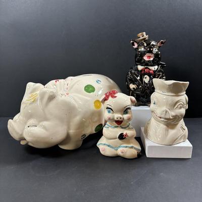 LOT 245 Vintage Ceramic Pig Collection: Relco Black Piggy Band, Polka Dot Piggy Bank, "Toby" Pig Pitcher and Little Girl Pig