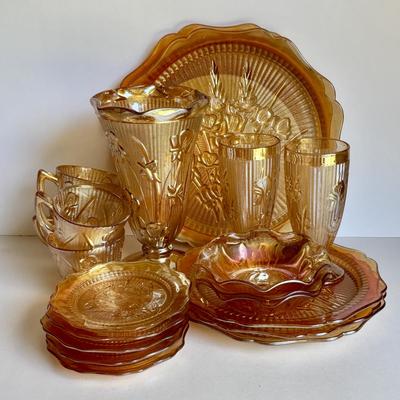 LOT 255: Jeanette Glass Iris and Herringbone Marigold Carnival Glass Collection