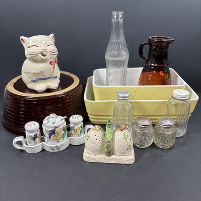 LOT 261: Hall for Westing House Refrigerator Dishes (no lids), Brown Glaze Bowl USA, Shawnee Cat Creamer, National Dairy Orange Juice...